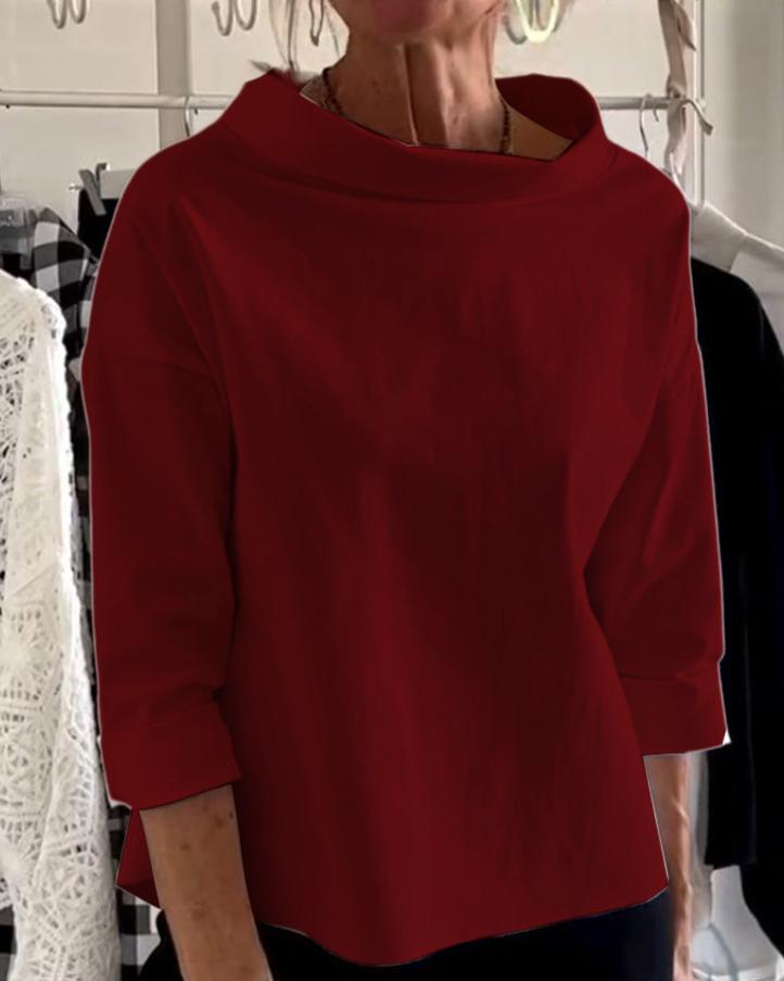 Stylowy damski top z eleganckim wysokim kołnierzem