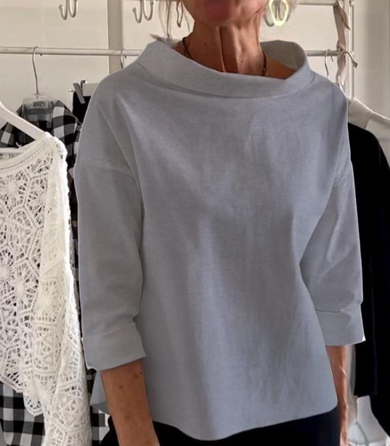 Stylowy damski top z eleganckim wysokim kołnierzem
