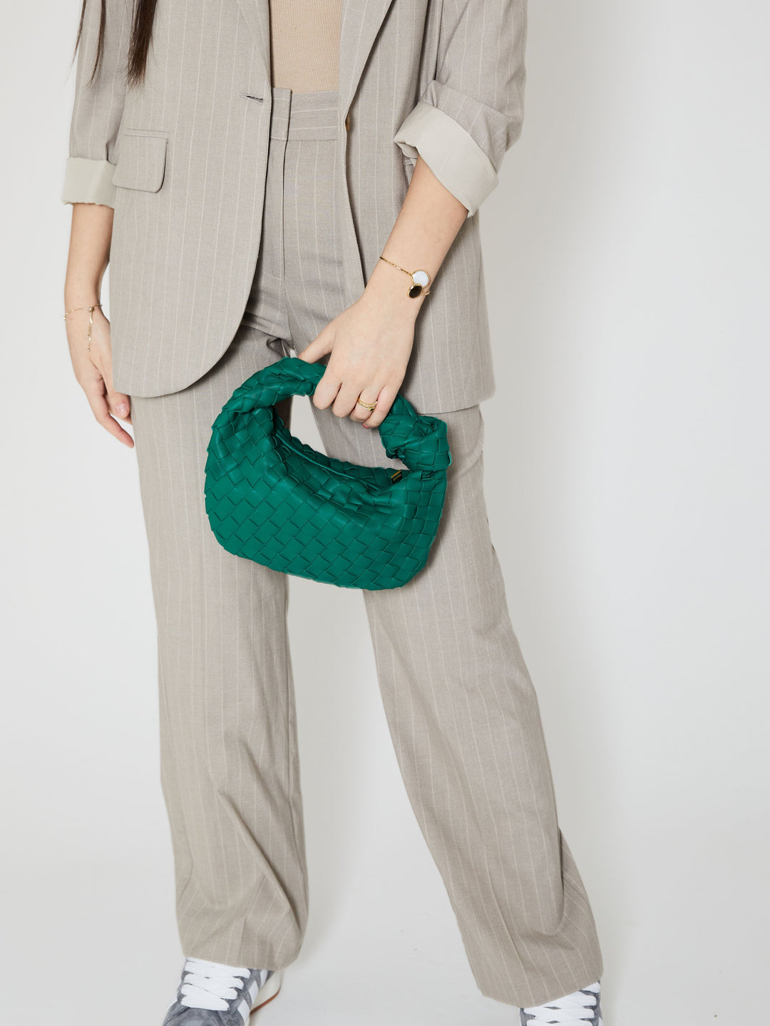 Veera | Etui tissé audacieux en teal pour un style chic et élégant