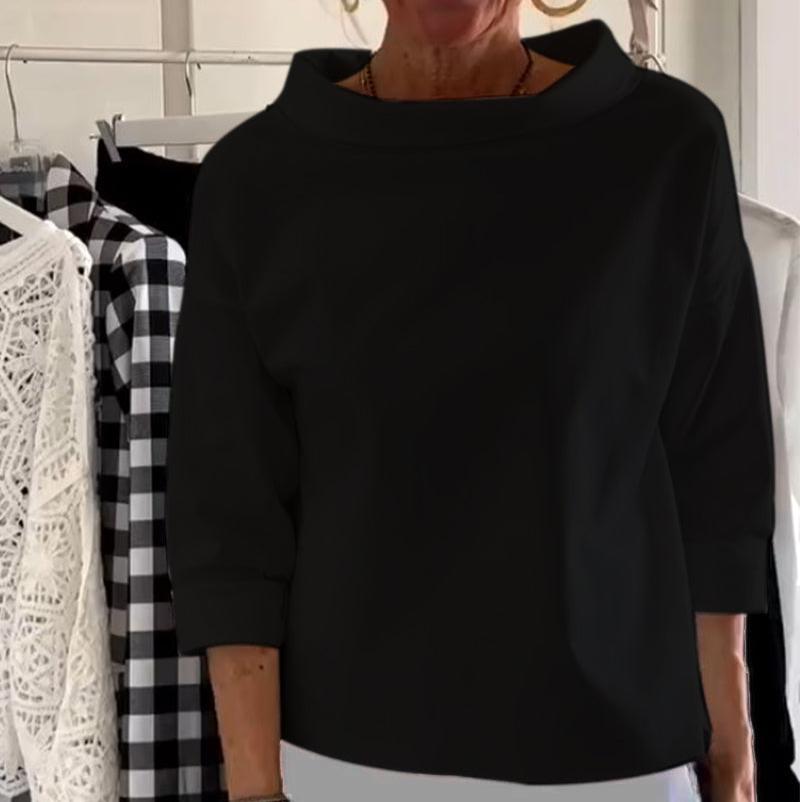 Stylowy damski top z eleganckim wysokim kołnierzem