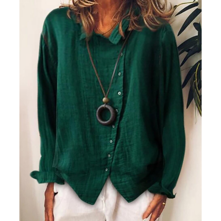 Damska luźna koszula z długim rękawem zapinana na guziki - wygoda i styl w swobodnym stylu