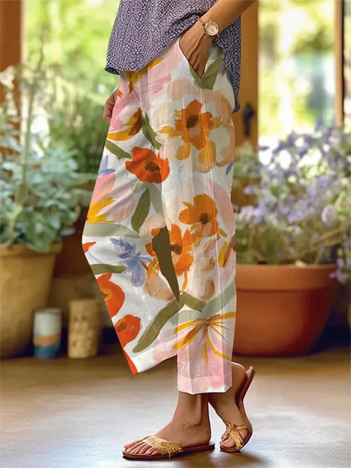 Eleganckie spodnie damskie z kwiatowym wzorem zapewniające stylowy wygląd