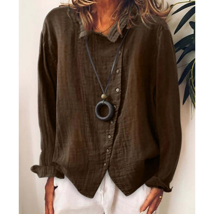 Damska luźna koszula z długim rękawem zapinana na guziki - wygoda i styl w swobodnym stylu