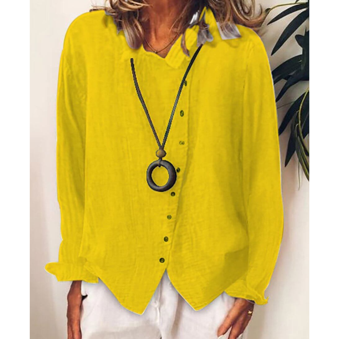 Damska luźna koszula z długim rękawem zapinana na guziki - wygoda i styl w swobodnym stylu