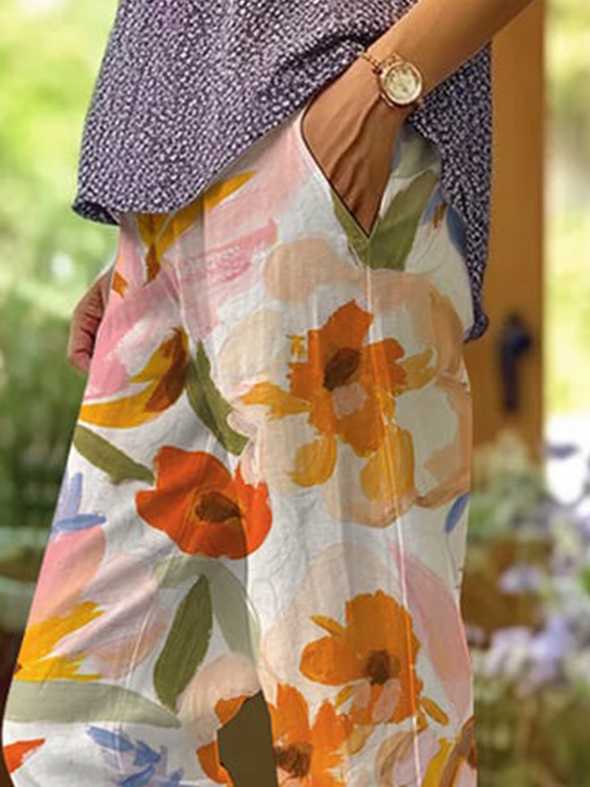 Eleganckie spodnie damskie z kwiatowym wzorem zapewniające stylowy wygląd