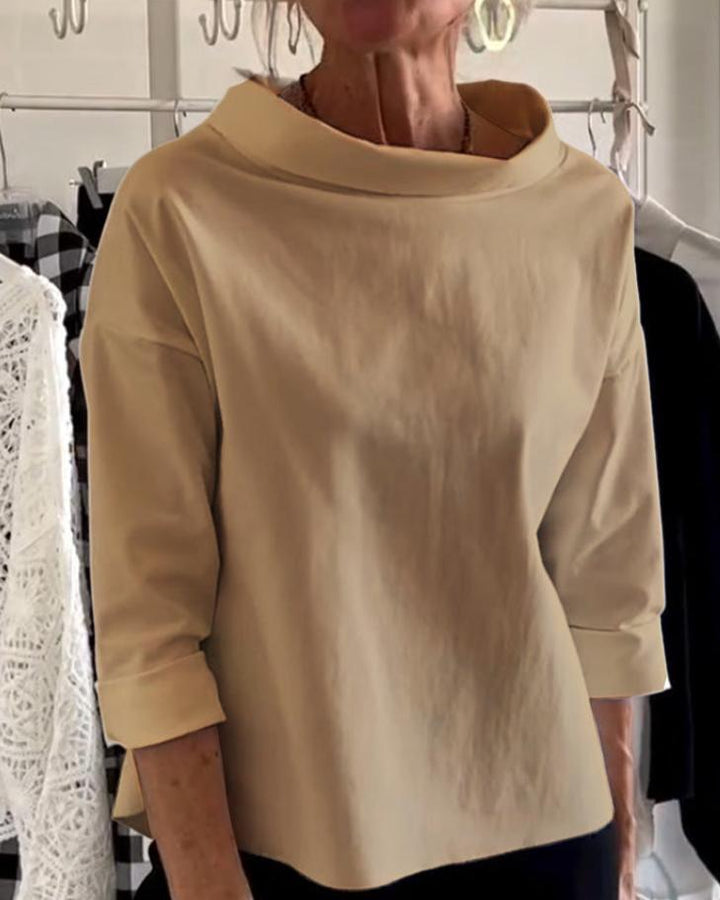 Stylowy damski top z eleganckim wysokim kołnierzem