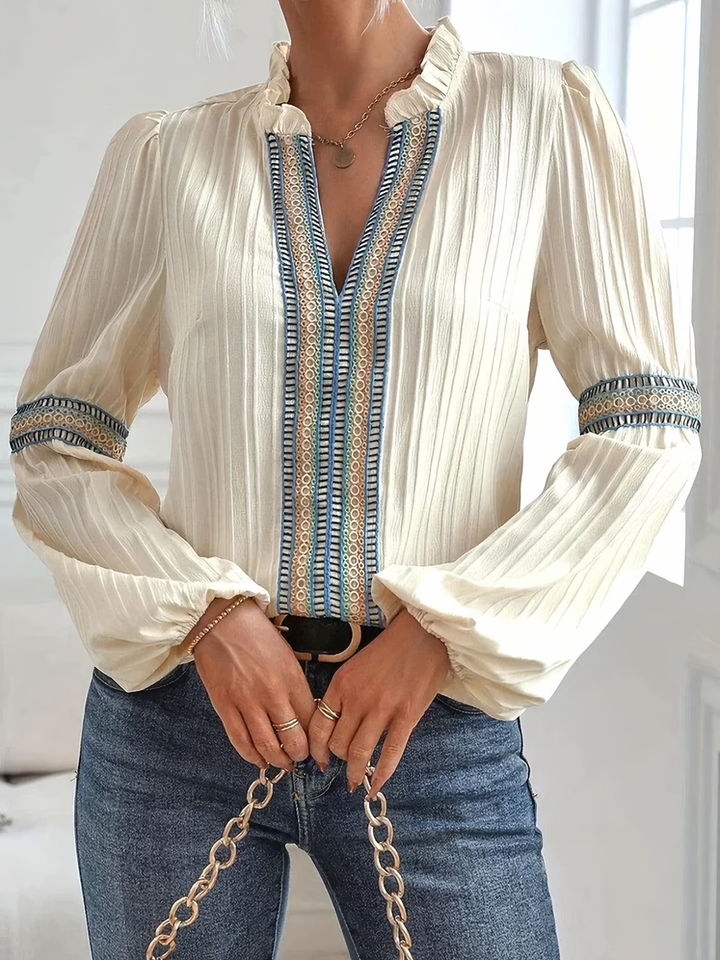 Elegancka bluzka damska ze stylowym koronkowym wykończeniem