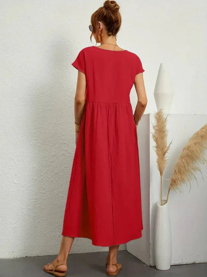 Elegancka długa sukienka damska zapewniająca stylowy wygląd