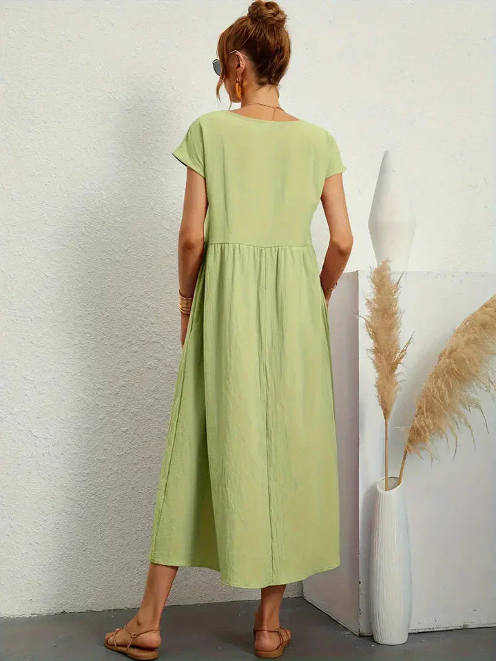 Elegancka długa sukienka damska zapewniająca stylowy wygląd