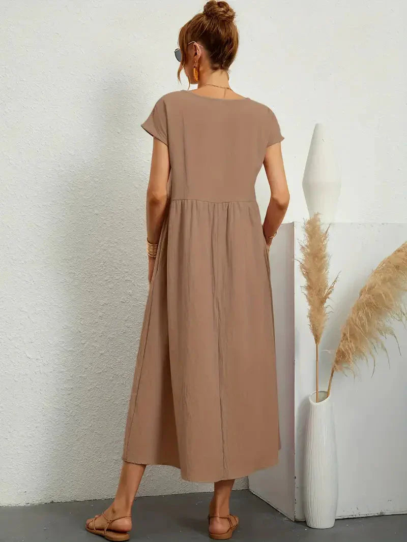 Elegancka długa sukienka damska zapewniająca stylowy wygląd