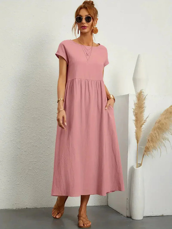 Elegancka długa sukienka damska zapewniająca stylowy wygląd