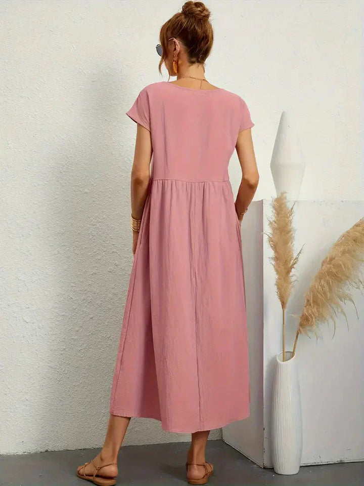 Elegancka długa sukienka damska zapewniająca stylowy wygląd