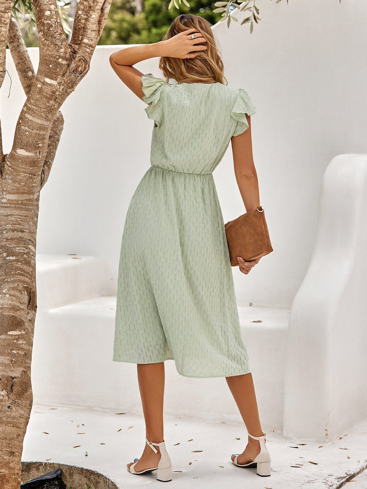 Elegancka damska sukienka midi na stylowe okazje