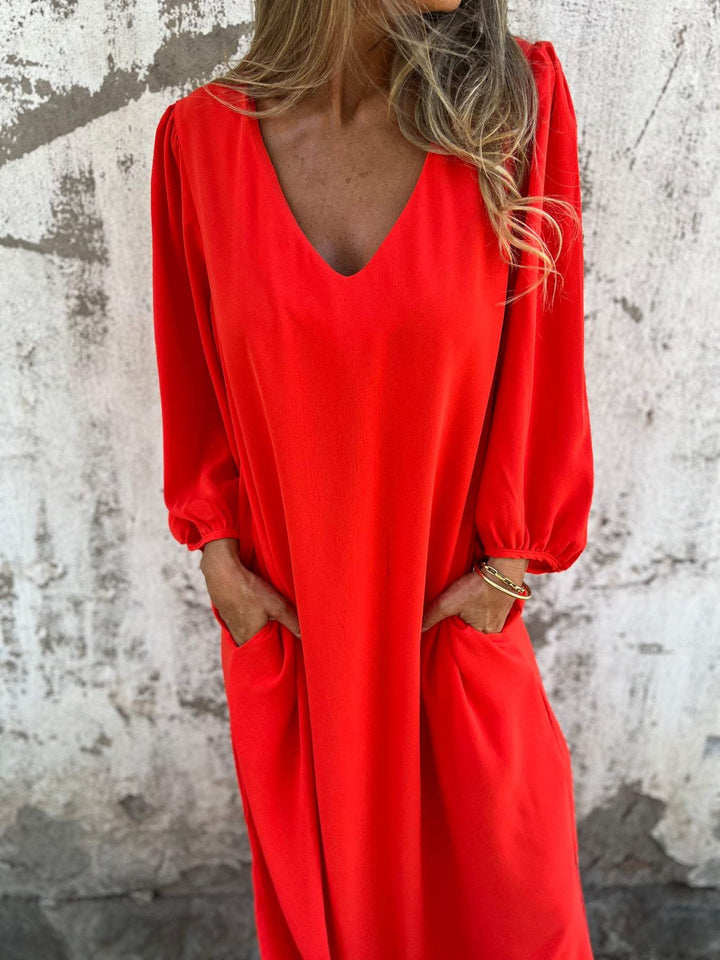 Stylowa damska sukienka maxi z dekoltem w szpic zapewniająca elegancki wygląd