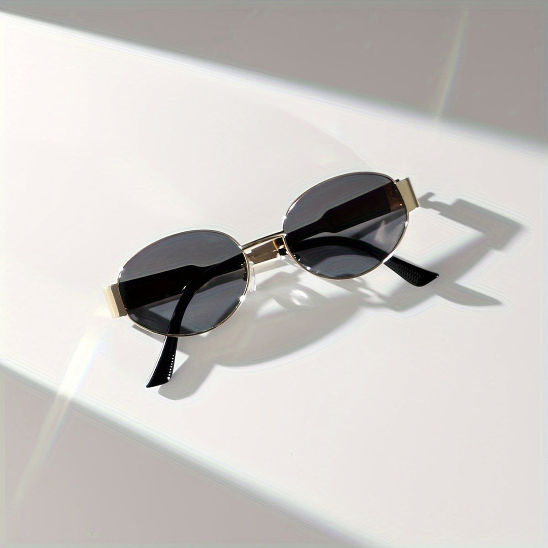 Majella | Elegante Ovale Zonnebril met Luxe Gouden Frame voor een Tijdloze Look