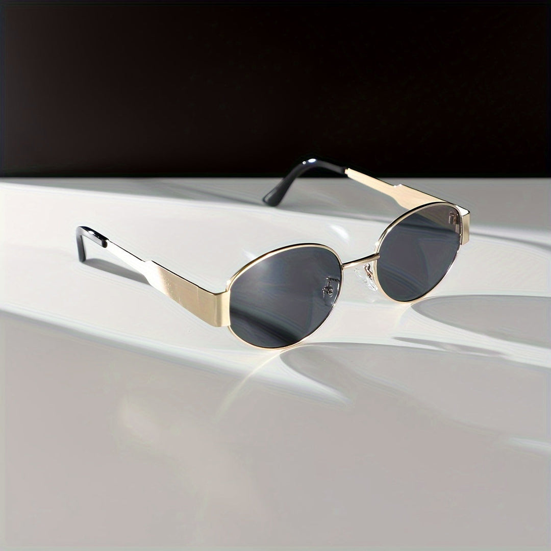 Majella | Elegante Ovale Zonnebril met Luxe Gouden Frame voor een Tijdloze Look