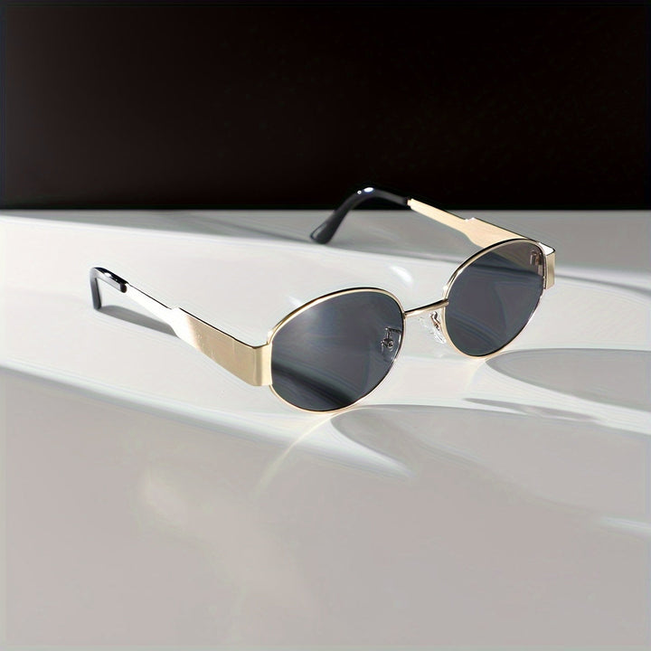 Majella | Elegante Ovale Zonnebril met Luxe Gouden Frame voor een Tijdloze Look