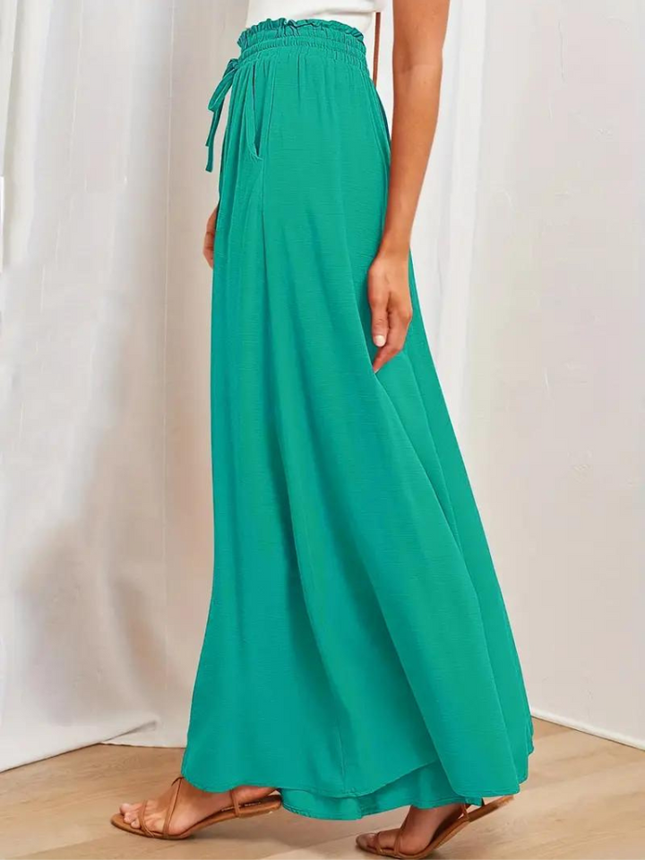 Eleganckie spodnie damskie z wysoką talią zapewniające stylowy wygląd