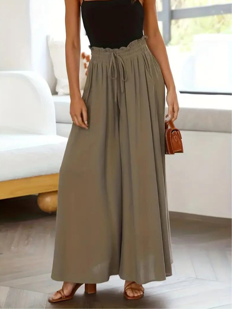 Eleganckie spodnie damskie z wysoką talią zapewniające stylowy wygląd