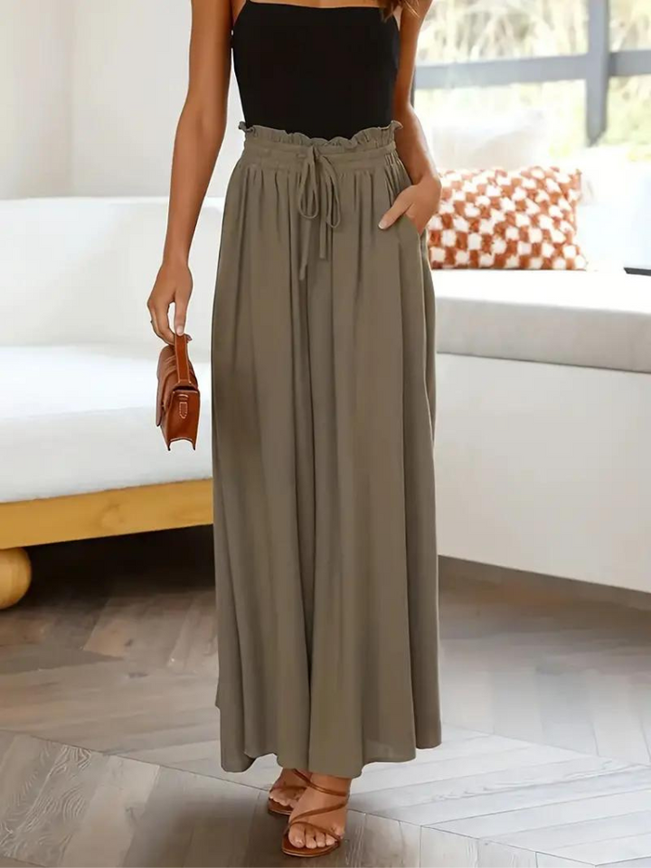 Eleganckie spodnie damskie z wysoką talią zapewniające stylowy wygląd