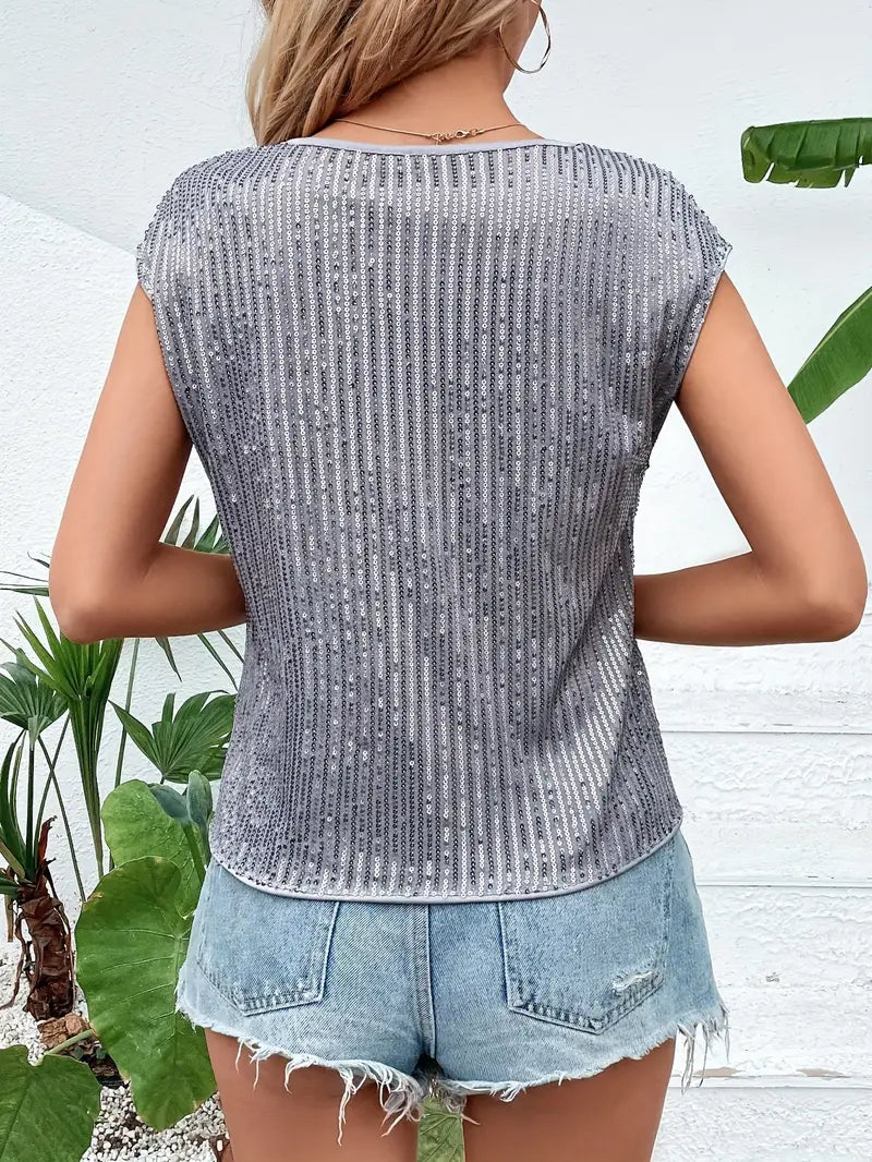 Elegancka brokatowa bluzka damska - stylowy wygląd na każdą okazję