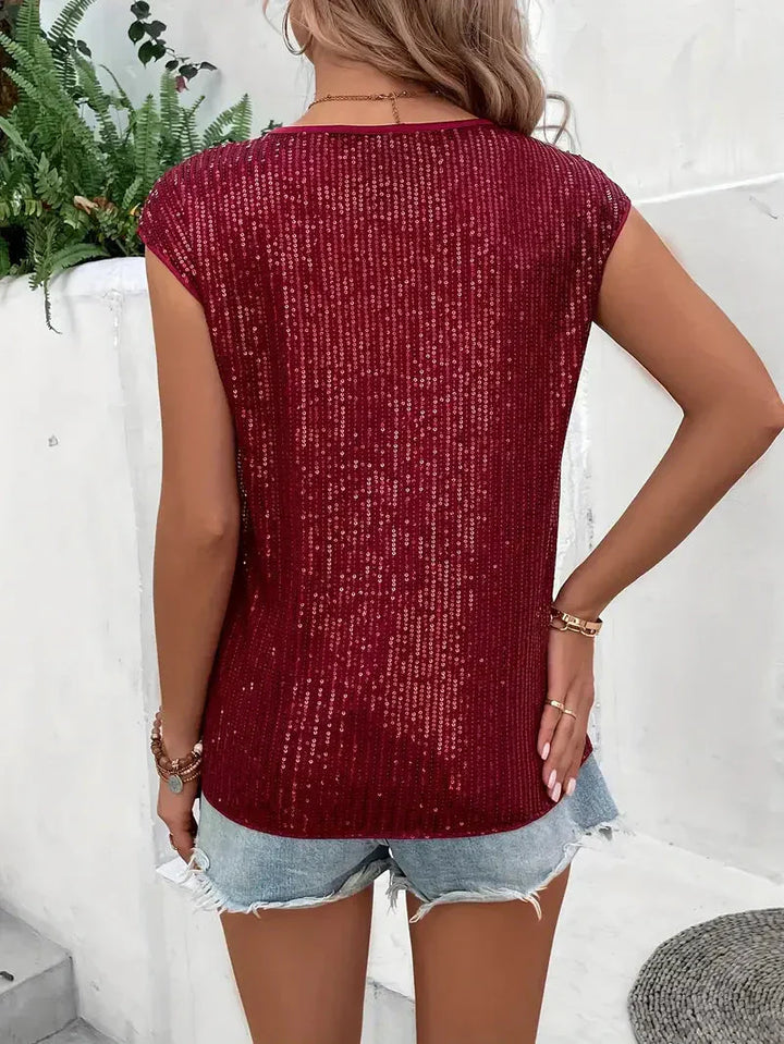 Elegancka brokatowa bluzka damska - stylowy wygląd na każdą okazję