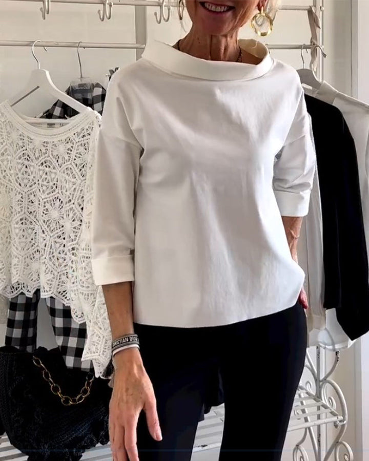 Stylowa bluzka damska z rękawem 3/4 i eleganckim dekoltem w łódkę