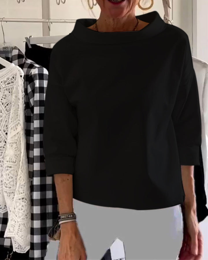 Stylowa bluzka damska z rękawem 3/4 i eleganckim dekoltem w łódkę