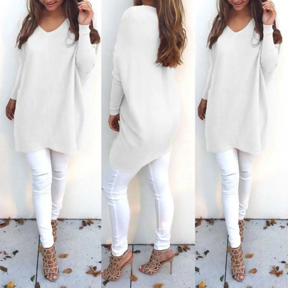 Stylowy sweter damski o średniej długości zapewniający modny wygląd