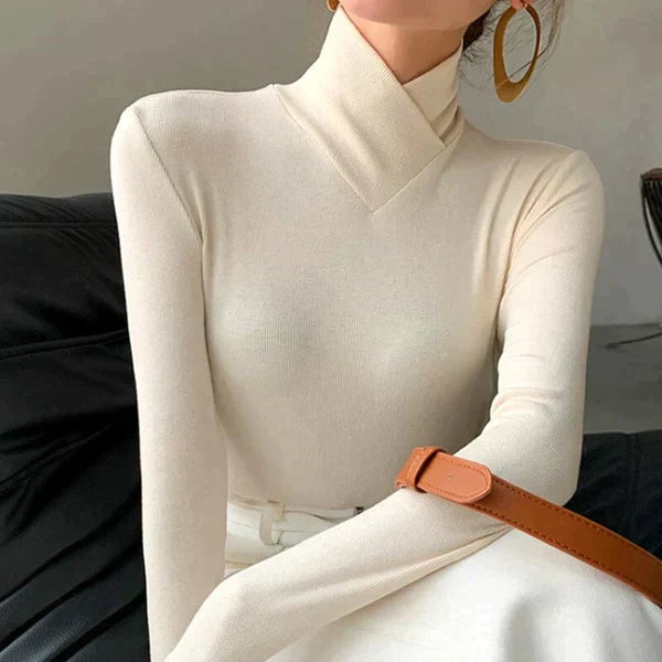 Elegancki damski sweter z golfem zapewniający stylowy zimowy wygląd