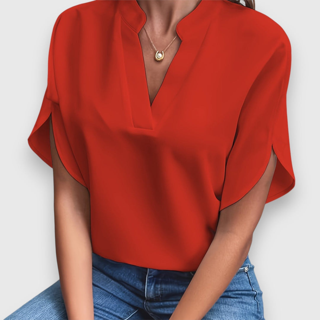 Elegancka bluzka damska wykonana z wysokiej jakości tkaniny premium