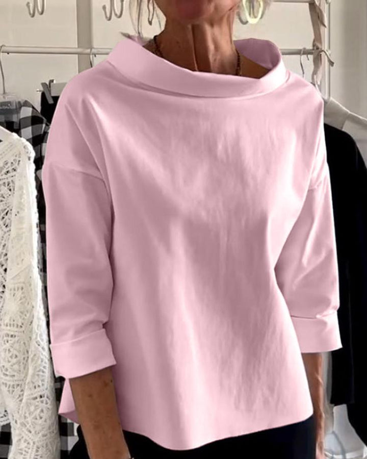 Stylowy damski top z eleganckim wysokim kołnierzem