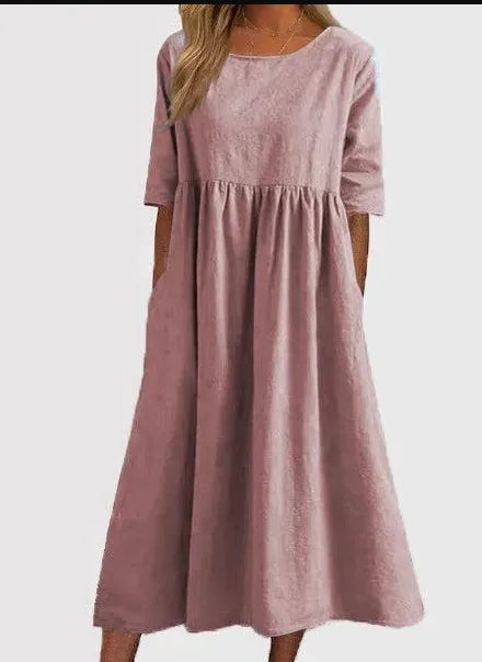 Silvia™ - Elegancka bawełniana sukienka z okrągłym dekoltem i wygodnymi kieszeniami